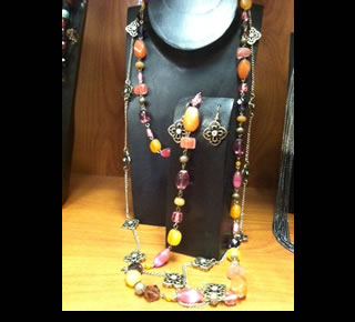 Spring Fever Quartz and Stone Glass shown with Whimsical Necklace